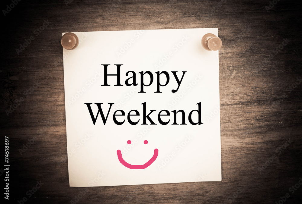 Happy weekend concept on note paper Happy weekend concept on note paper