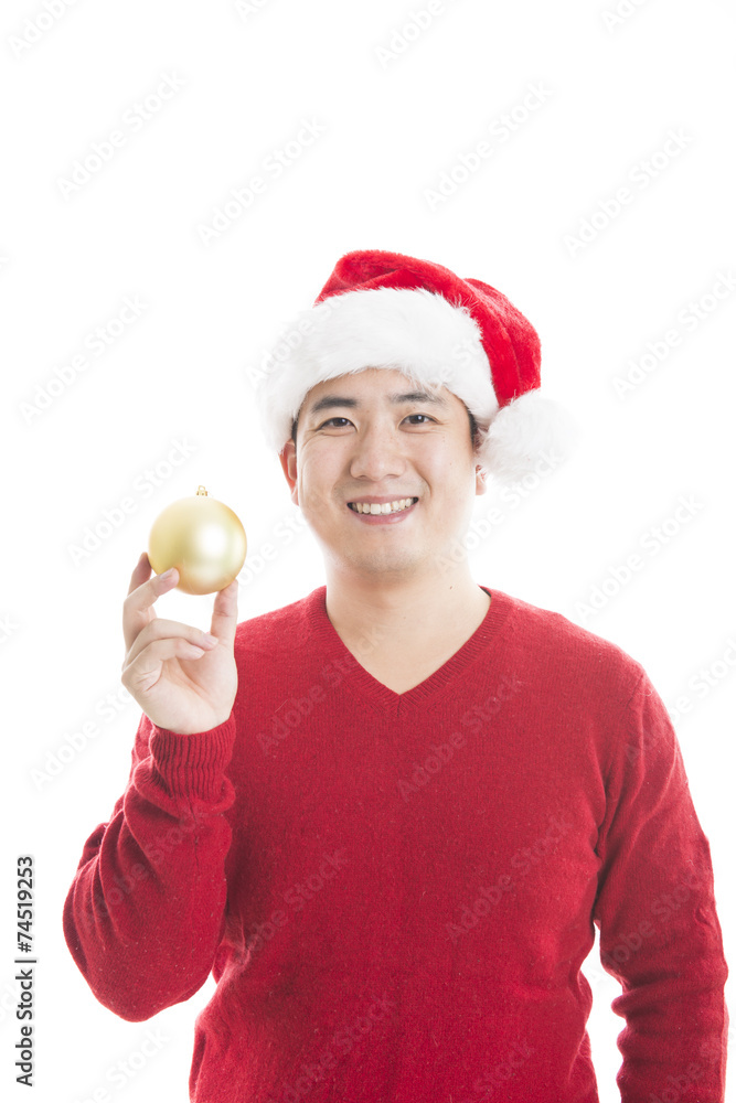Young asian man with Christmas hat isolated on white. Young asian man with Christmas hat isolated on white.