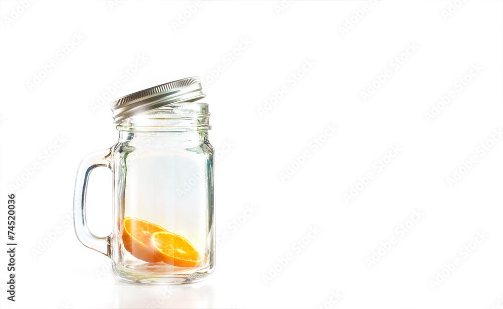 Orange sliced in the Mug on white background, blank text Orange sliced in the Mug on white background, blank text