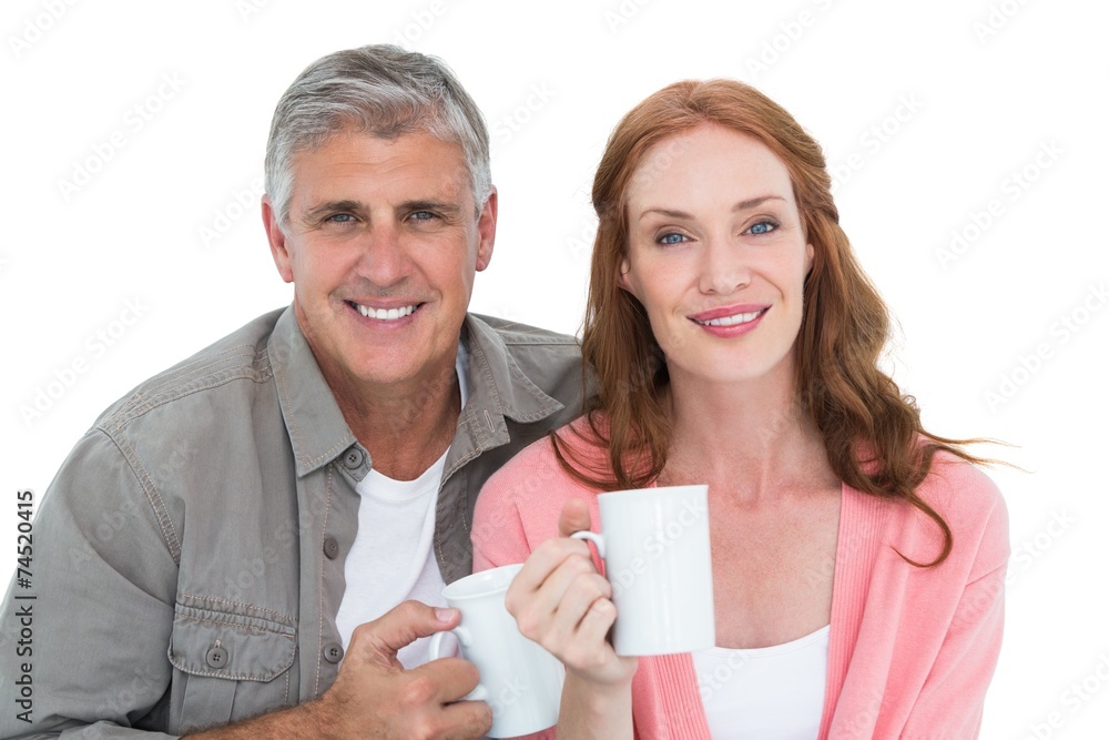 Casual couple having coffee together Casual couple having coffee together