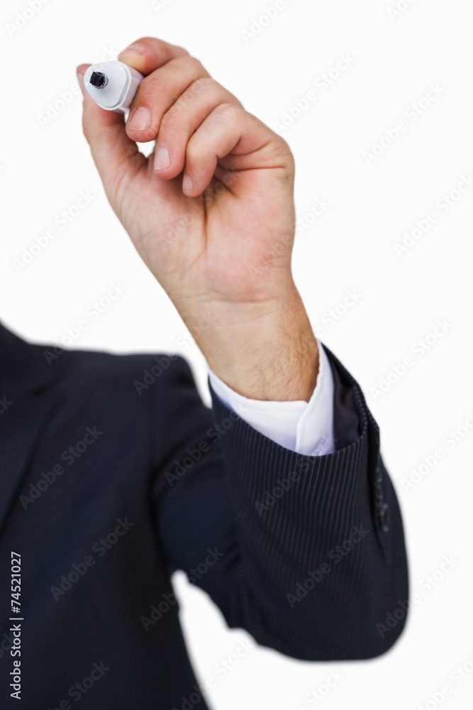 Hand of a businessman writing with marker Hand of a businessman writing with marker
