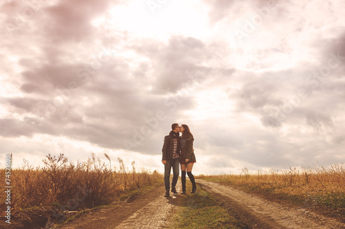 Landscape portrait of young beautiful stylish couple sensual and