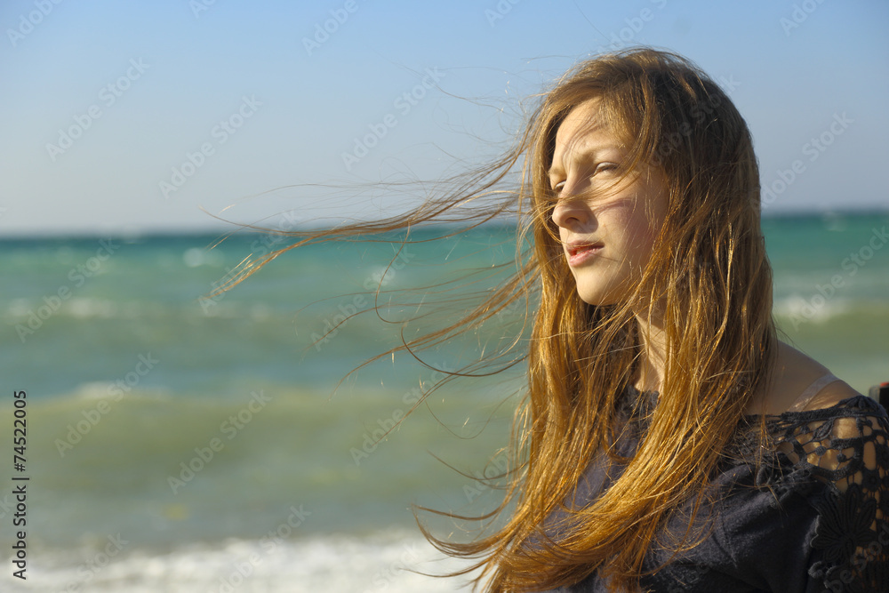 beautiful girl with long hair on the coast beautiful girl with long hair on the coast