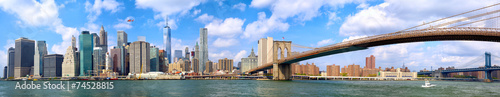 Manhattan skyline and Brooklyn Bridge panorama in New York
