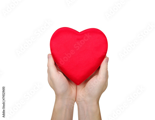 Red heart in hand