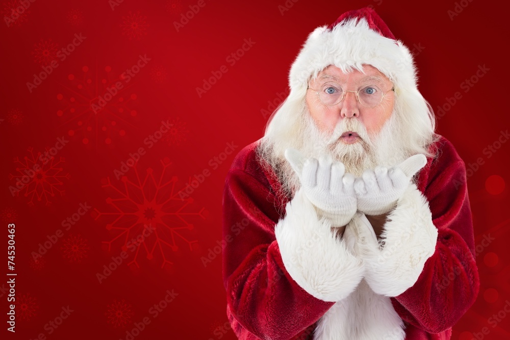 Composite image of santa claus blows something away Composite image of santa claus blows something away