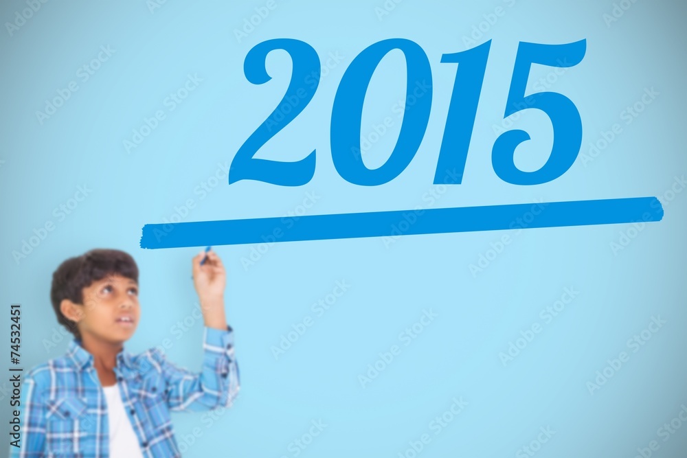 Composite image of cute boy smiling and writing Composite image of cute boy smiling and writing