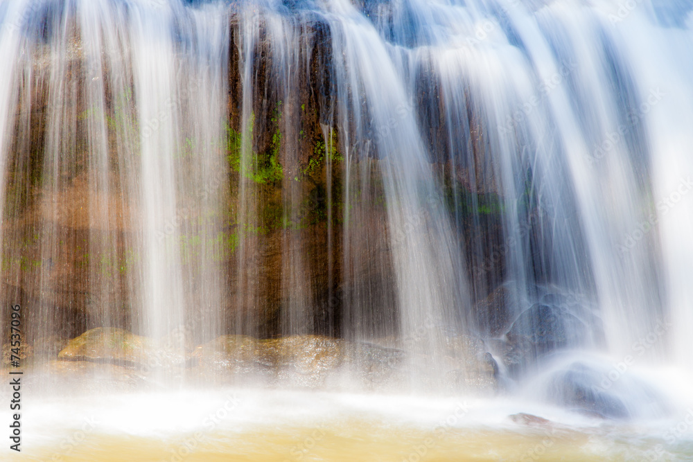 Close-up scenic waterfall flowing on stone at Mae Sa waterfall D Close-up scenic waterfall flowing on stone at Mae Sa waterfall D