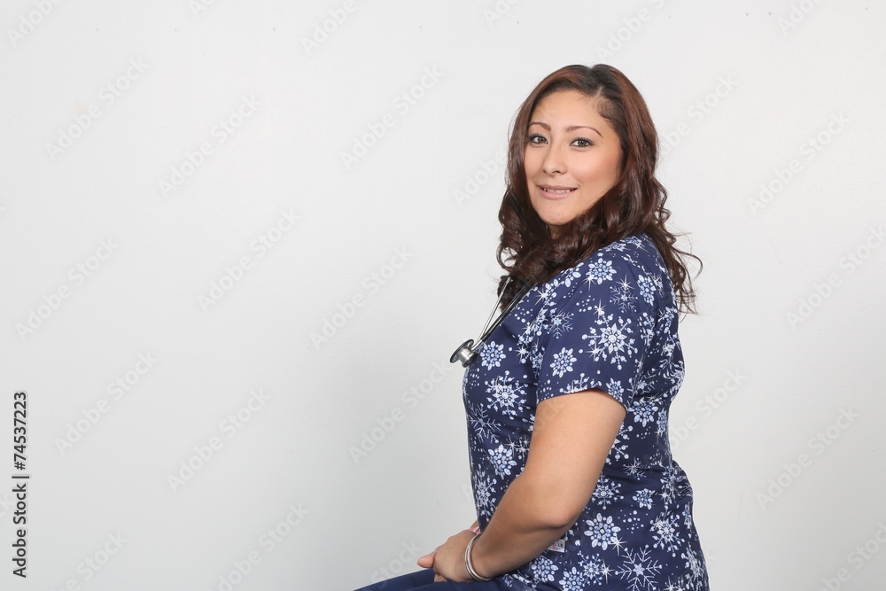 Portrait Young Hispanic Female Nurse with copy space Portrait Young Hispanic Female Nurse with copy space