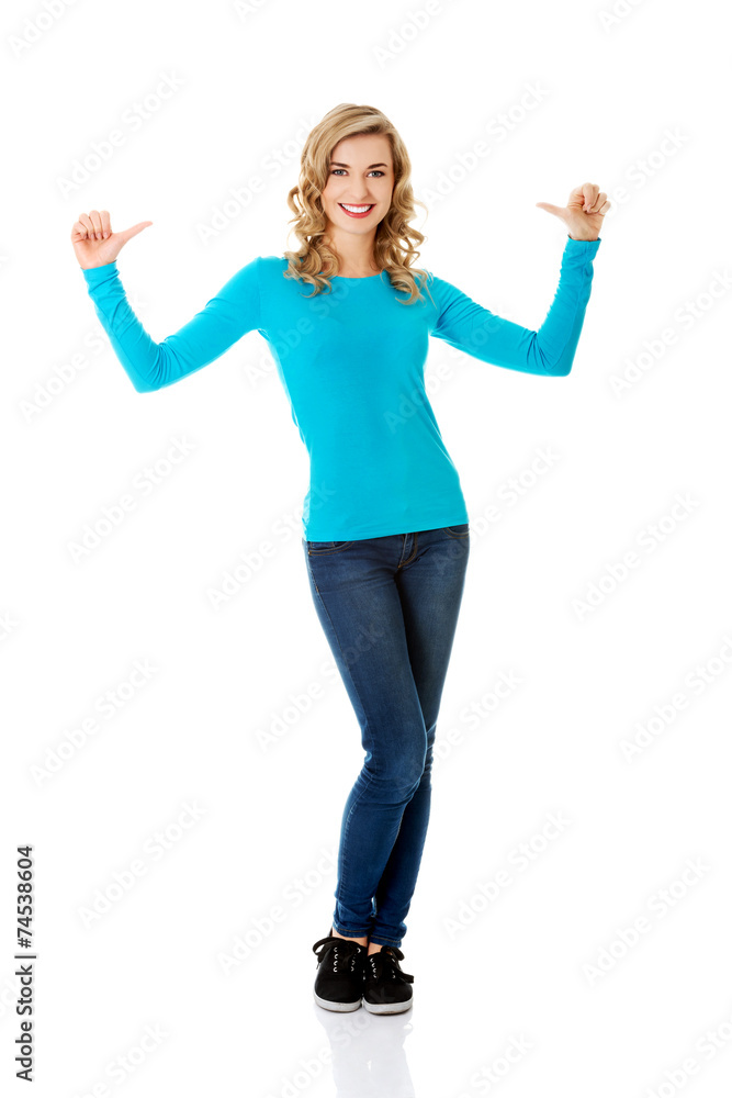 Full length woman pointing on herself Full length woman pointing on herself