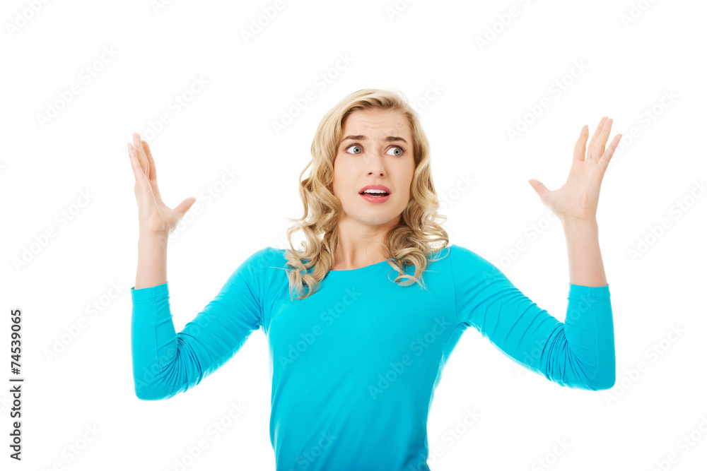 Portrait of angry woman with hands up Portrait of angry woman with hands up