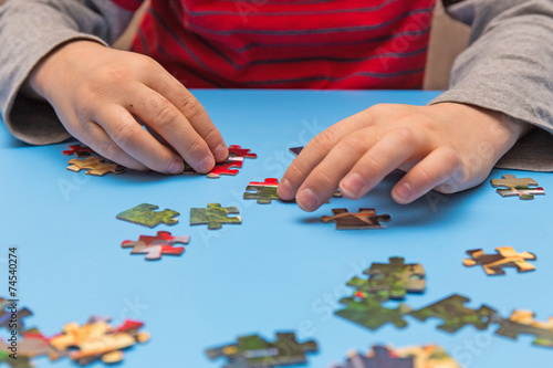 child and puzzles