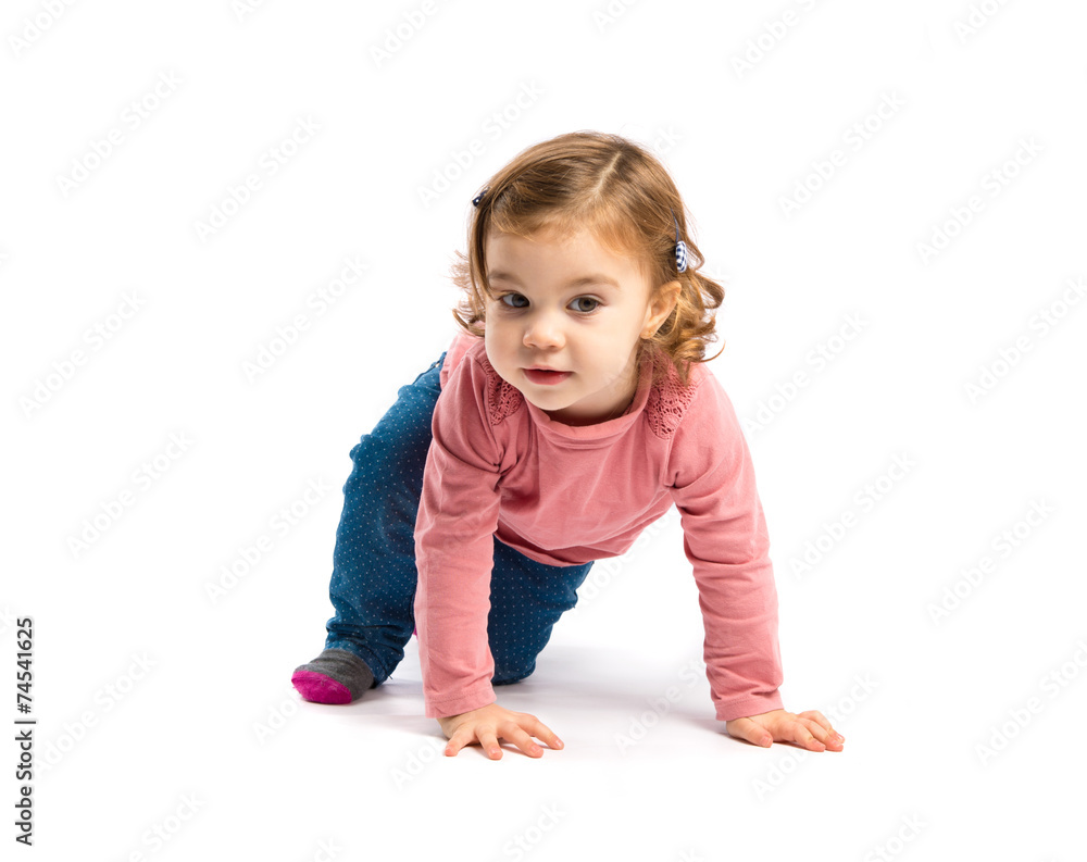 Little girl crawling over white background Little girl crawling over white background