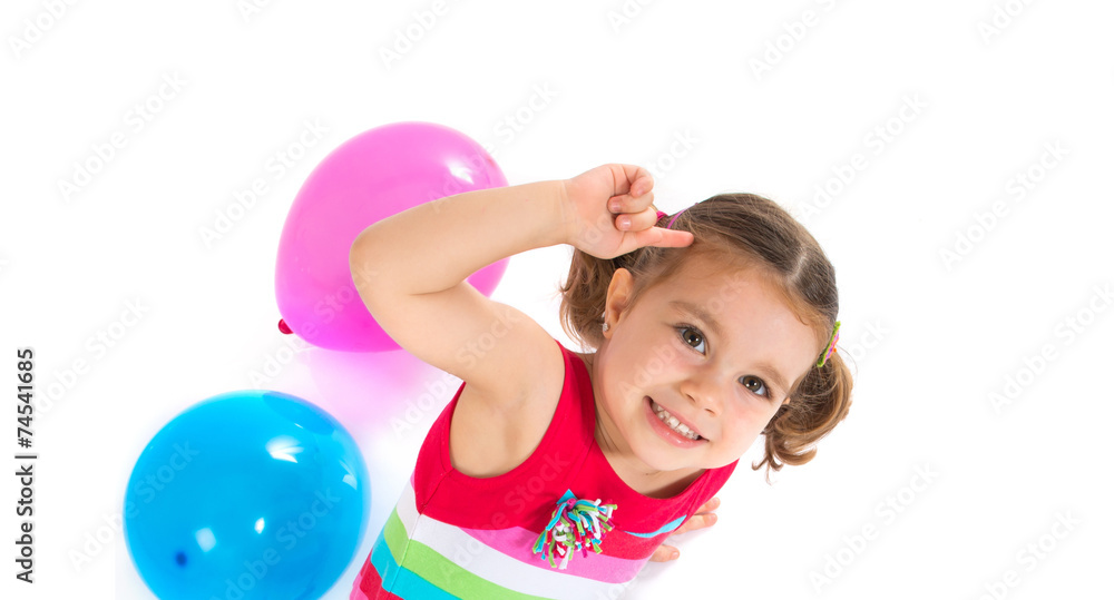 Kid playing with balloons over white background Kid playing with balloons over white background