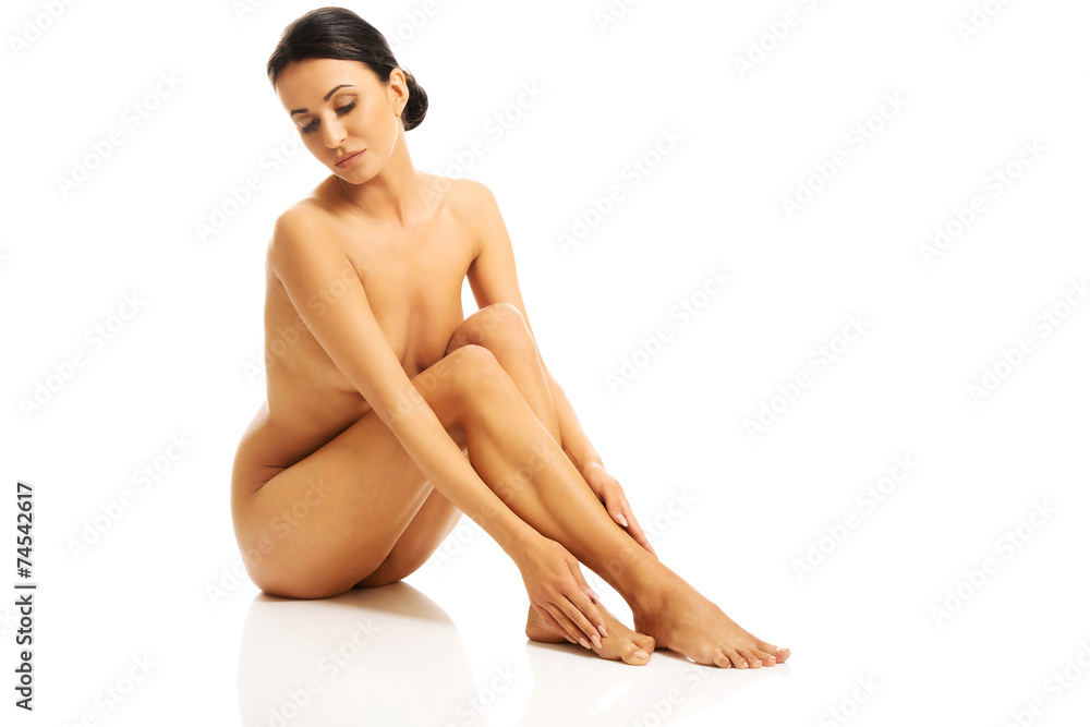 Fototapeta premium Full length photo of nude woman sitting