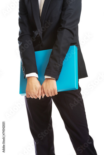 Close up on businesswoman holding a binder