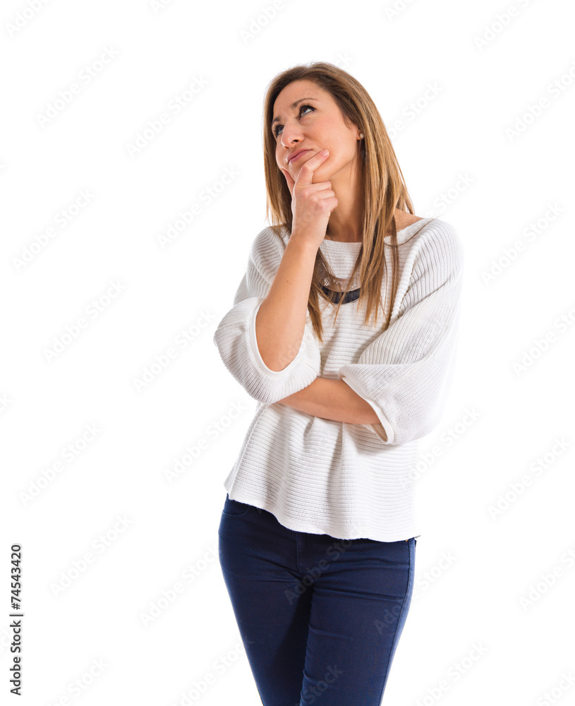 Woman having doubts over white background Woman having doubts over white background