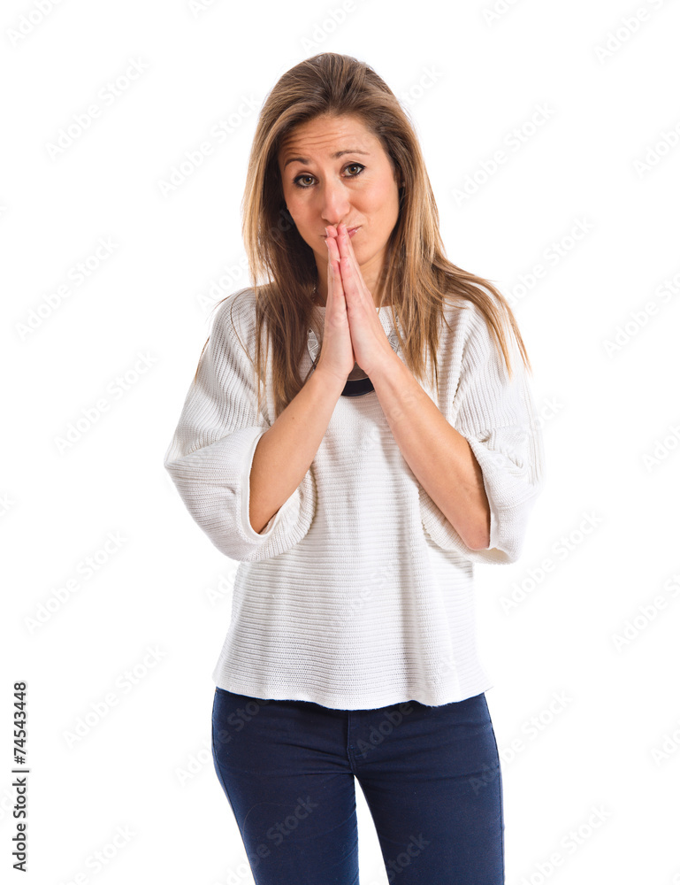 Woman pleading over white background Woman pleading over white background