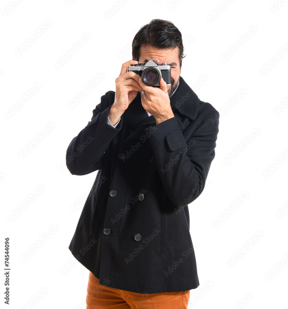 Handsome man photographing something Handsome man photographing something
