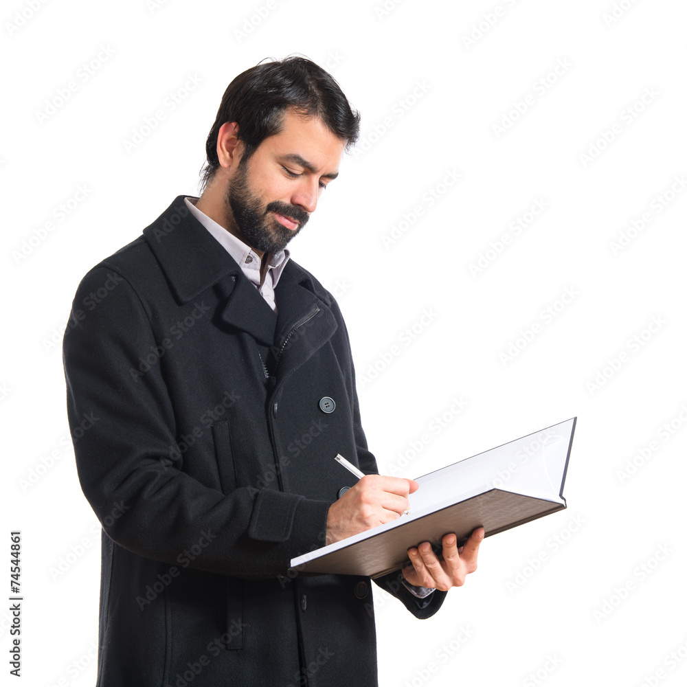 Handsome man reading book