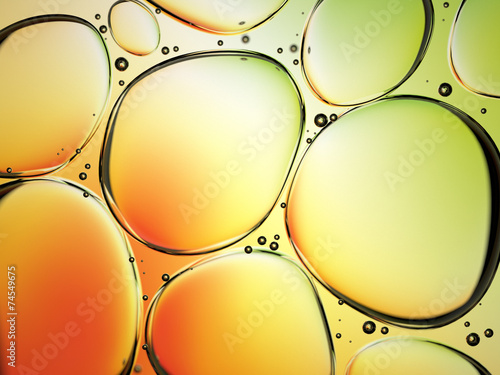 water drops in oil on colorful background
