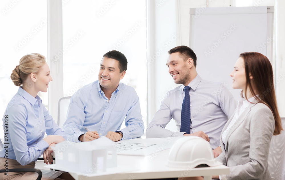 happy team of architects and designers in office happy team of architects and designers in office