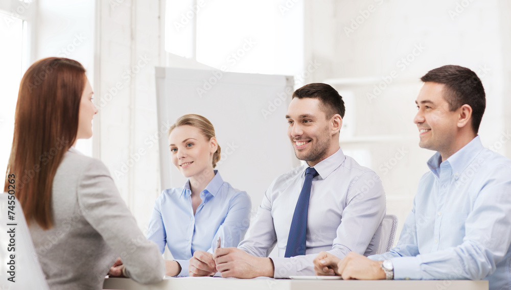 smiling businesswoman at interview in office smiling businesswoman at interview in office