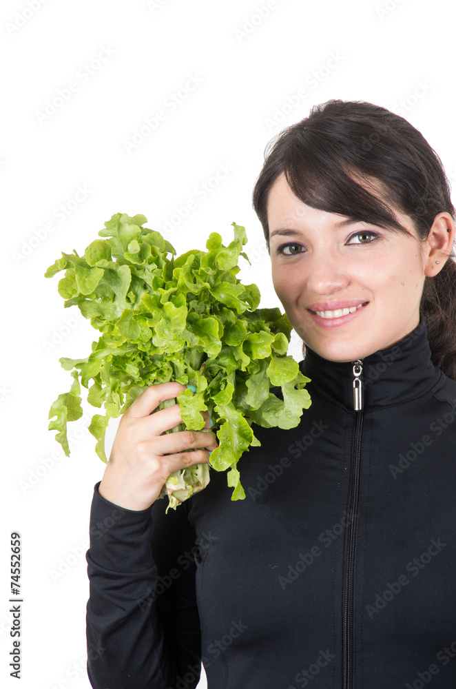 closeup portrait of beautiful young girl holding fresh lettuce closeup portrait of beautiful young girl holding fresh lettuce