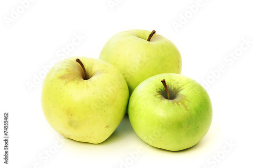 Three green apple on a white background