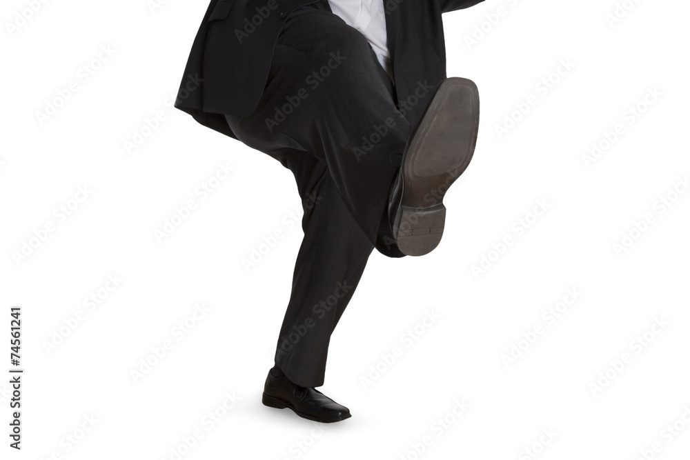 Man in suit slipping on wet floor Stock Photo | Adobe Stock