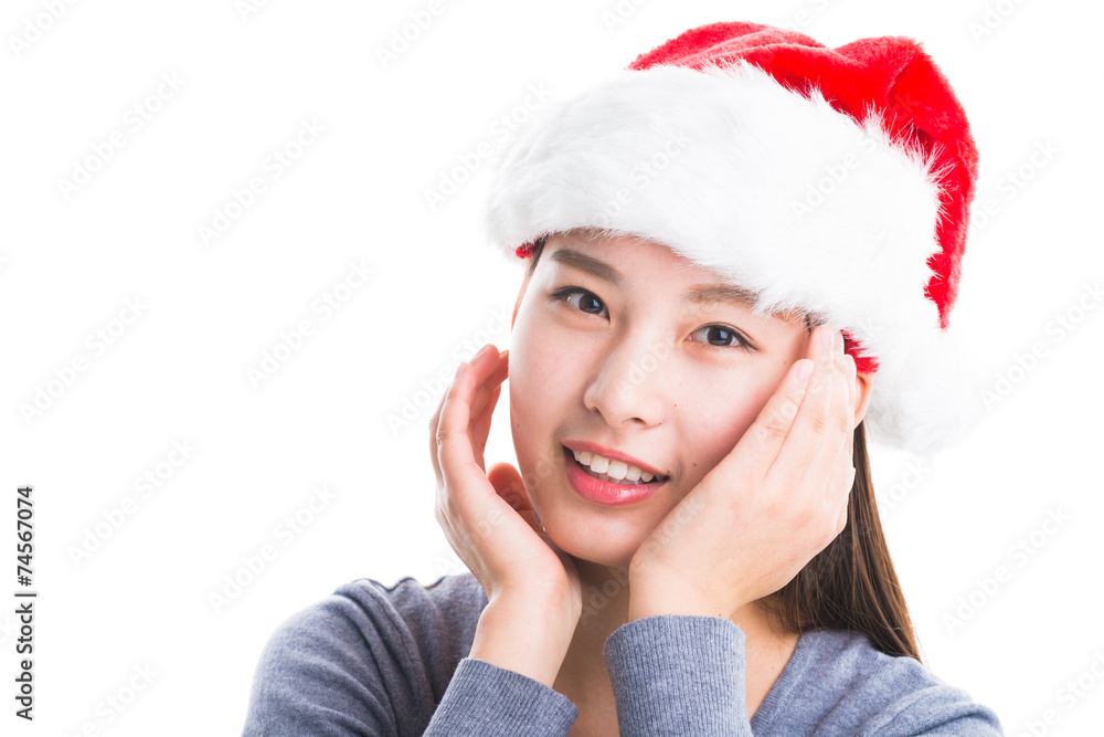 Young asian woman with Christmas hat isolated on white. Young asian woman with Christmas hat isolated on white.