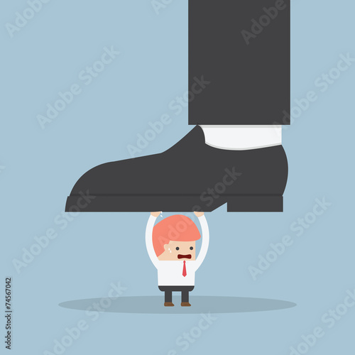 Businessman holding big businessman foot