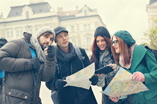 Group Of Tourists Sightseeing City