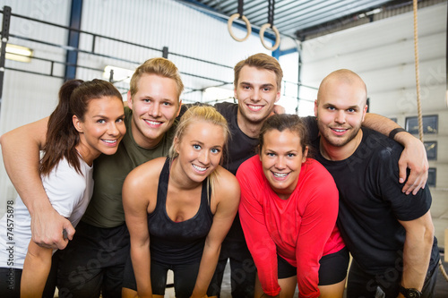 Happy People Standing Together At Cross Training Box © Tyler Olson