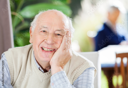 Portrait Of Happy Senior Man At Nursing Home