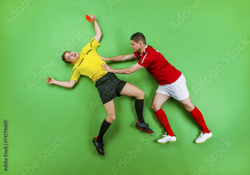 Football player and referee photo