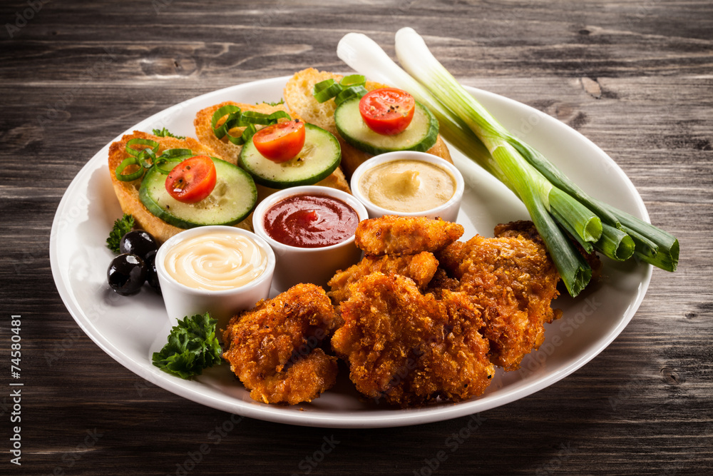 Grilled chicken nuggets and vegetables Grilled chicken nuggets and vegetables