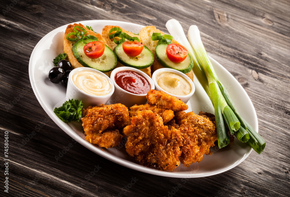 Grilled chicken nuggets and vegetables Grilled chicken nuggets and vegetables