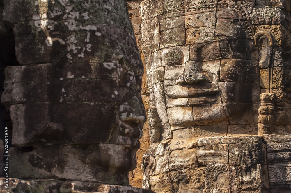 Ancient stone face of Bayon temple Ancient stone face of Bayon temple