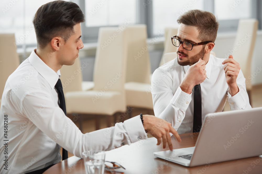Business People. Successful business partners discuss project. T Business People. Successful business partners discuss project. T
