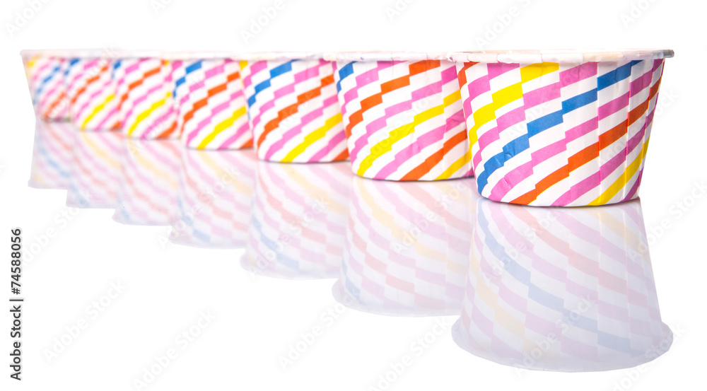 Obraz premium Cupcake paper baking cups over white background