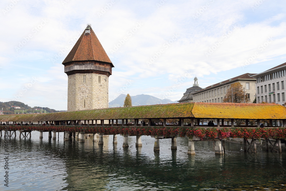 View on the old wooden chapel bridge in Lucerne Switzerland .