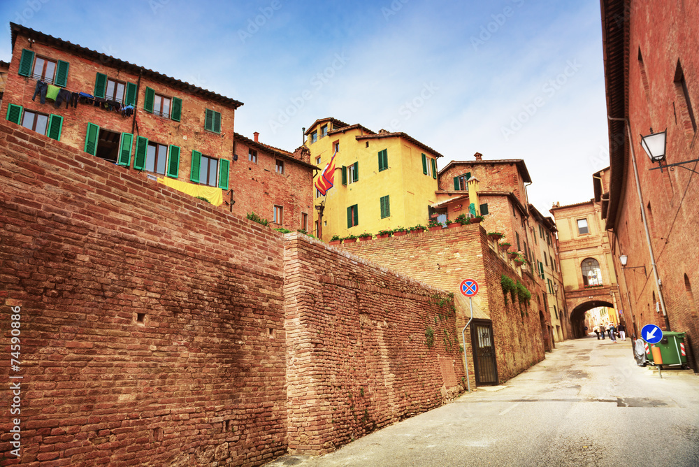 Small town street view in Sienna, Italy