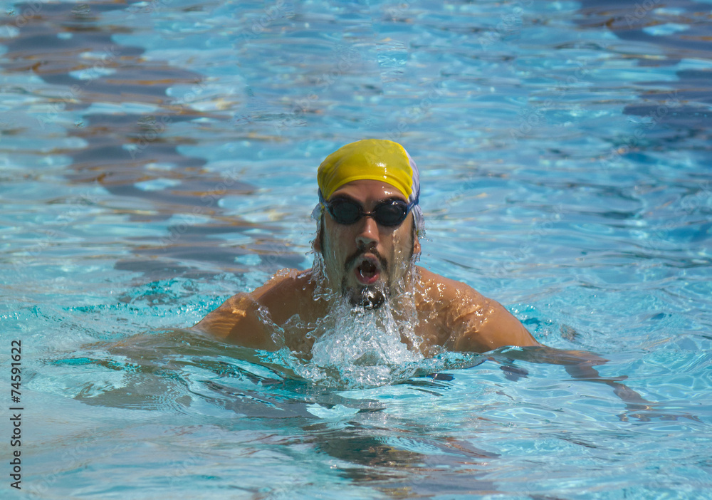 portrait swimmer beautiful boy swims in pool crawl