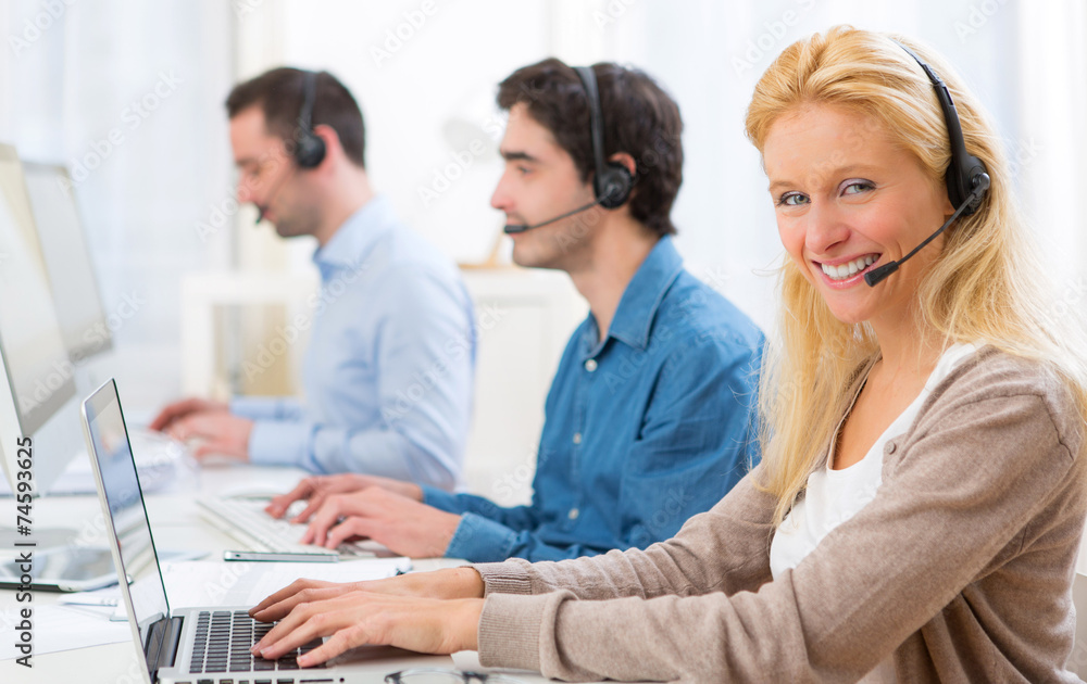 Young attractive woman working in a call center Young attractive woman working in a call center
