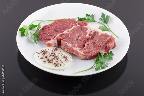 Fresh Red Beef Ribs with Dill and Green Sprouts