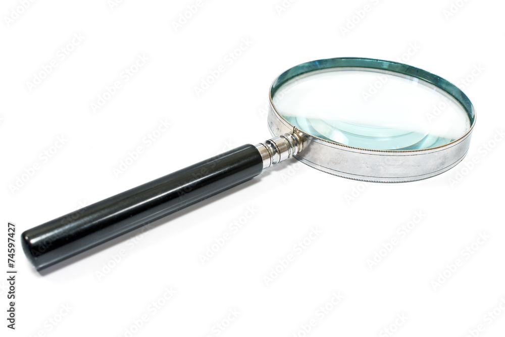 Antique magnifying glass isolated on white Antique magnifying glass isolated on white