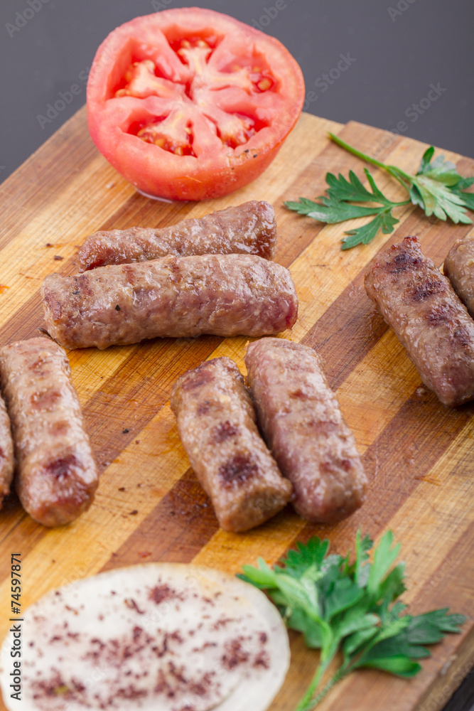 inegol Meatball on a wood plate inegol Meatball on a wood plate