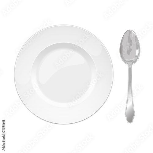 isolated china plate and steel spoon on a white background
