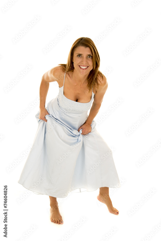 woman in a blue formal lean forward hold dress